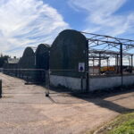 An old barn with no roof and corroded steels prior to refurbishment