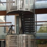 Curved mesh style staircase railings