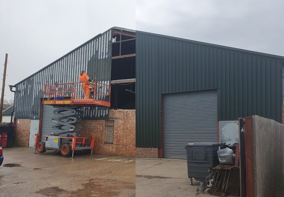 Exterior of an agricultural barn being re-clad with steel cladding.