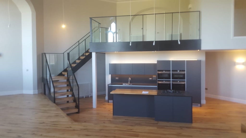 Staircase leading to internal mezzanine by K & J Fabrication